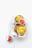 Mini courgette and ricotta flans with tomato coulis