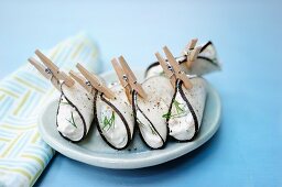 Black radish rolls filled with cream cheese and tuna