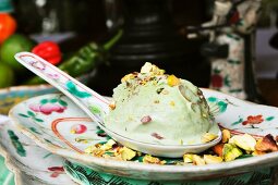 Pistachio ice cream with chopped nuts