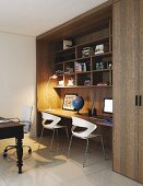 Custom shelving with integrated desk