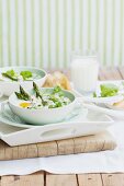 Baked eggs with asparagus and peas