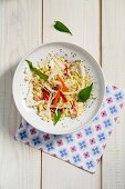 Savoury millet salad with white cabbage and strips of pepper