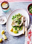Steamed snapper fish with broad beans