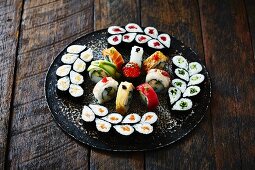 A sushi platter on a wooden surface