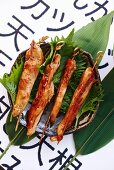 Teriyaki skewers on shiso leaves (Japan)