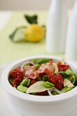 Insalata di fave (bean salad with dried tomatoes and bacon, Italy)