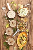 Various porcini mushroom dishes: soup, sauce, tortellini, bake with potatoes and porcini mushrooms with mozzarella