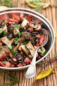 Porcini mushroom salad with beluga lentils and tomatoes