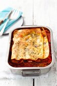 Vegetarian ratatouille lasagne with pepper, aubergine, courgette, onion and tomatoes
