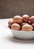 Brown eggs in a bowl