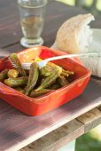 Greek style pickled okra with white bread and wine