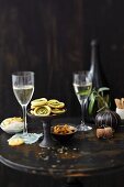 Various snacks and champagne on a table