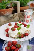 Swiss roll with strawberries and cream