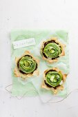 Puff pastry bowls filled with asparagus and black pudding
