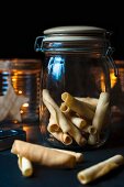 A jar of homemade tuille biscuits for Christmas