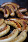 Sausages in a pan (close-up)