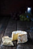 Soft cheese on a wooden surface