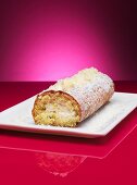 Lemon and mascarpone Swiss roll with lemon zest