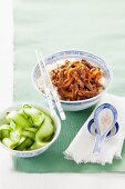 Stir-fried strips of beef with ginger, soy sauce and sake served with a cucumber salad