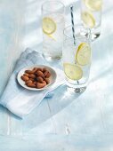 Gin and tonic and almonds