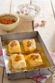 Bacalao a la Llauna (stock fish with peppers, white wine and garlic, Spain)