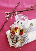 Melon soup with fruit pieces and berries