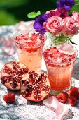 Rose and pomegranate drink with raspberry syrup