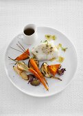 Steamed cod with a horseradish sauce and oven-baked vegetables