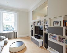 Private Apartment, London, United Kingdom. Architect: Hill Mitchell Berry, 2014. Modern pouffe used as coffee table in living room