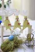 Easter bunnies hand-crafted from fabric remnants and cardboard