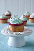 Red Velvet Cupcake with Cream Cheese Frosting and Pink Sprinkles