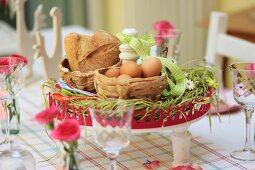 A woven basket made from bread as decoration for an Easter table