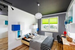 Modern bedroom with desk and shelving modules