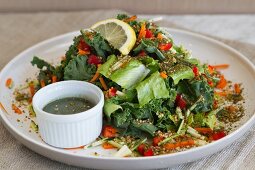 Kale salad with carrots, courgettes and a seaweed dressing