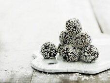 Rum balls with coconut flakes