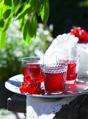 Redcurrant lemonade on a table outside