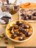 Marzipan pralines with chocolate glaze and nuts