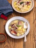 Sauerkraut soup with smoked ribs and potatoes