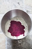 Beetroot pasta dough being made