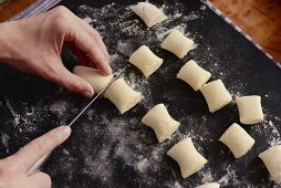 Gnocchi being portioned