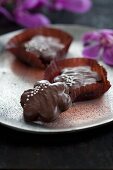 Chocolate biscuits decorated with silver pearls