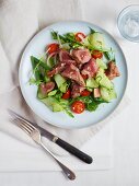 A colourful salad with lamb fillet strips