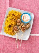 Curried rice with koftas and yoghurt sauce