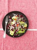 Rice salad with kidney beans, avocado, rocket and chilli