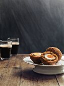 Scotch eggs and Guinness (Great Britain)