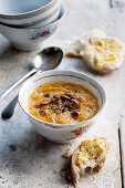 Curry soup with pumpkin, carrots and coconut