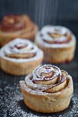 Shortcrust apple roses with icing sugar