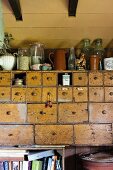 Old apothecary cabinet in country-house kitchen