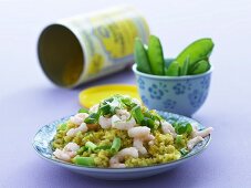Curried rice with prawns, spring onions and mange tout