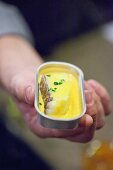Cod in saffron sauce in an opened tin